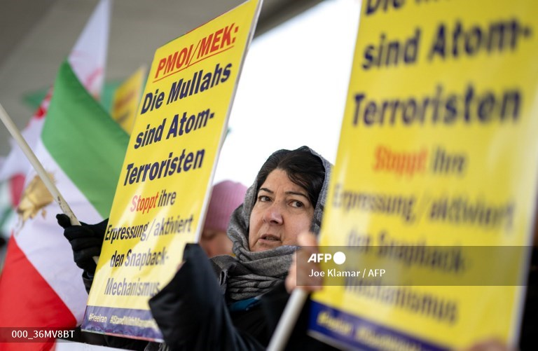 Dozens of Iranian expats and members of the National Council of Resistance of Iran (NCRI) take part in an anti-Iran government protest outside the headquarters of the International Atomic Energy Agency (IAEA) during the IAEA's Board of Governors meeting in Vienna