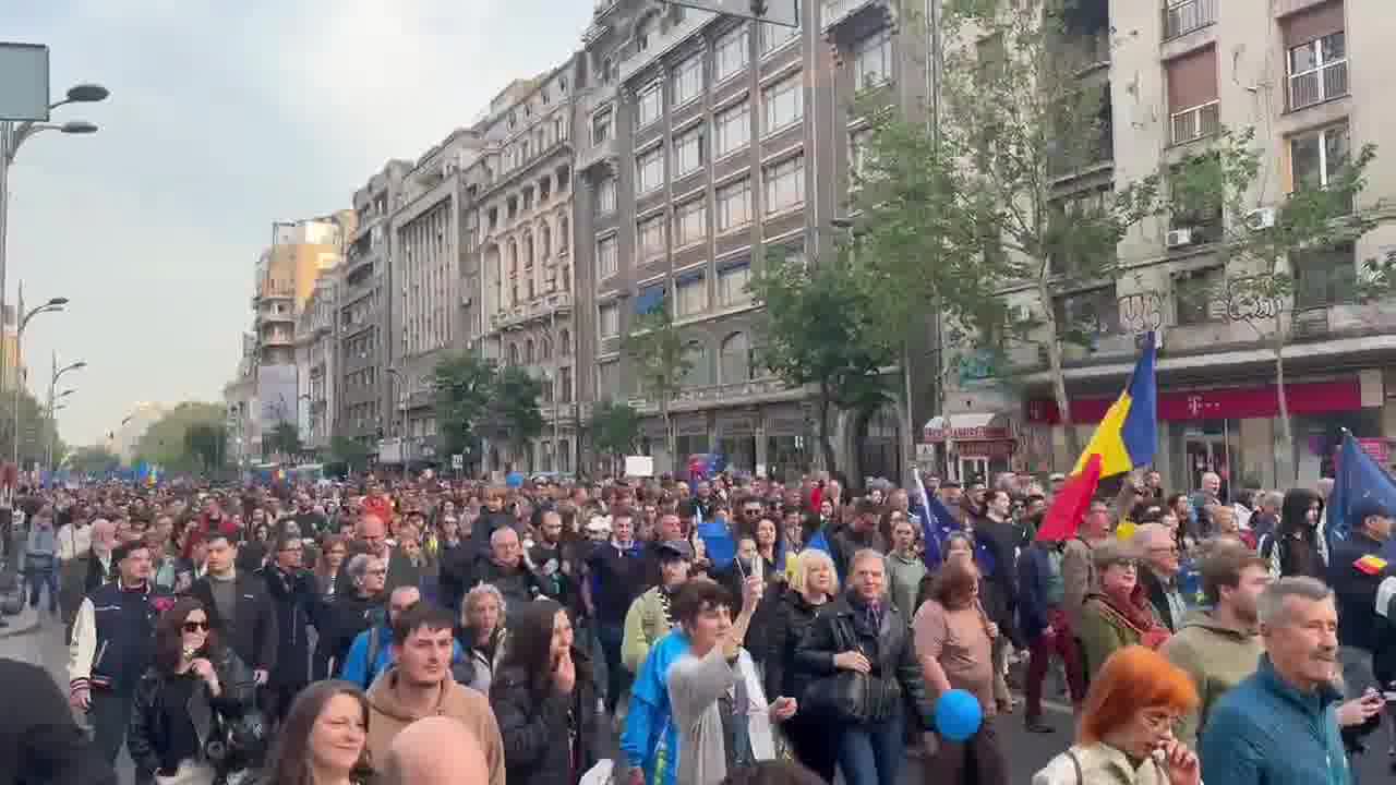 Tens of thousands of Romanians (with the number is rapidly growing) have taken to the streets of Bucharest right now. People are chanting Europe, we belong. and, as heard in the video, a chant that roughly translates to Russia, Romania will never be yours.