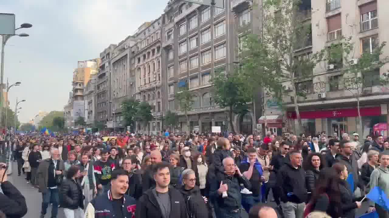 Tens of thousands of Romanians (with the number is rapidly growing) have taken to the streets of Bucharest right now. People are chanting Europe, we belong. and, as heard in the video, a chant that roughly translates to Russia, Romania will never be yours.